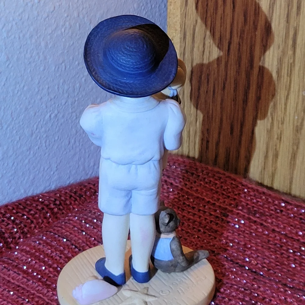 VINTAGE PORCELAIN BOY WITH DOLL FIGURINE 